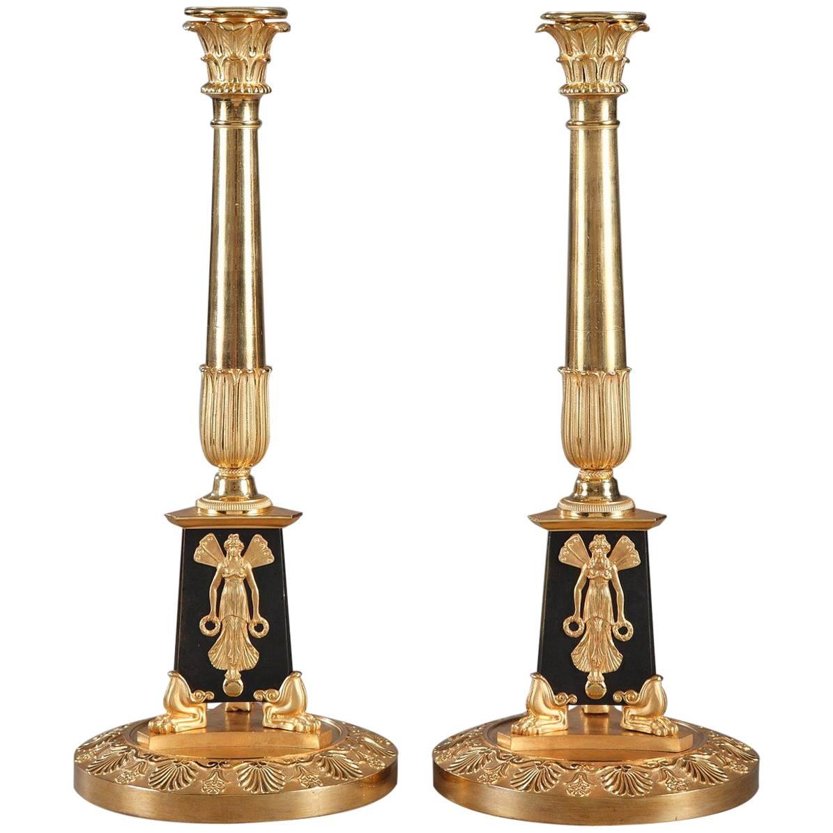 Pair of Empire Candlesticks with Allegories of Victory