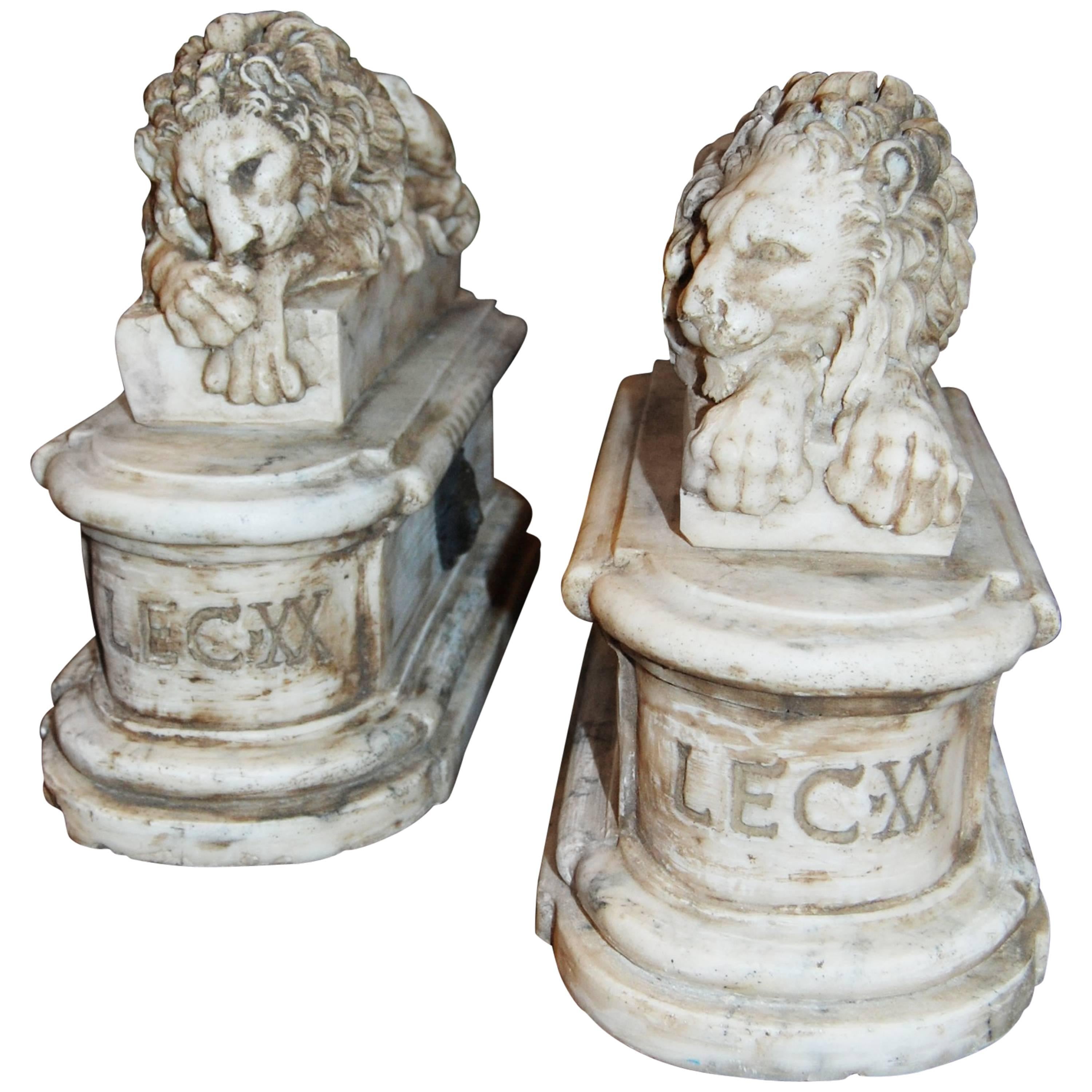 Pair of Carved Marble Lions on Marble Stands