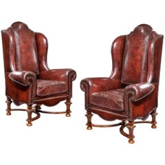 Antique Wing Armchairs in Leather