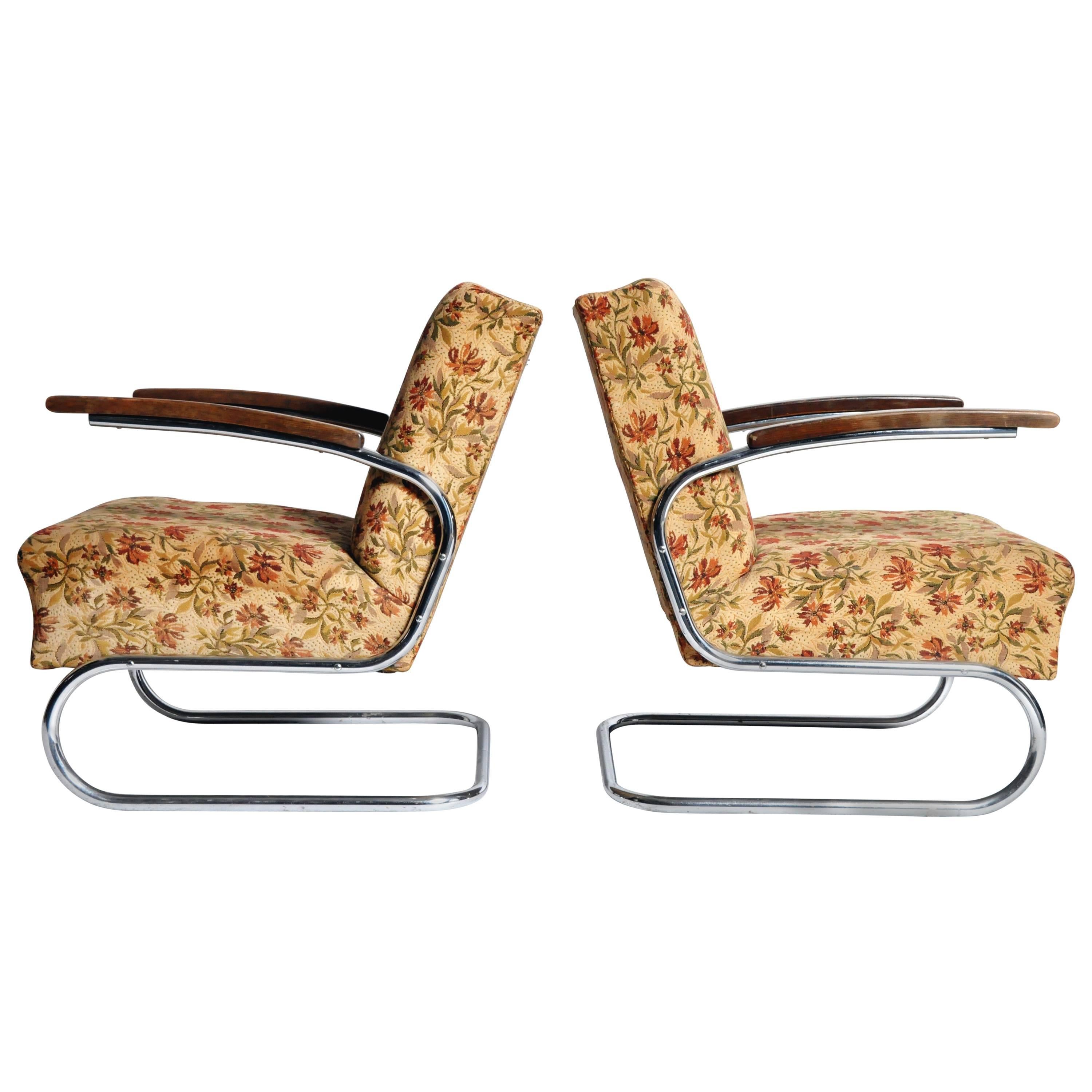 Pair of Chairs with Curved Chrome Legs