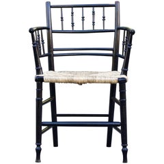 William Morris & Co Sillón Arts and Crafts Sussex Ebonizado