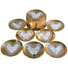 Piero Fornasetti - Ensemble de huit sous-verres en porcelaine pour l'amour:: années 1960