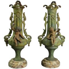 Pair of Large Antique Classical Polychromed Metal and Marble Cherubi Urns