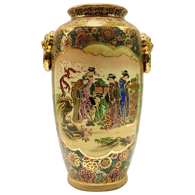 Japanese Satsuma Moriage Double Sided Hand-Painted Lion Handle Vase.