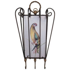 Used Wrought Iron Hooks Inset with Hand-Painted Belgian Tile with a Parrot