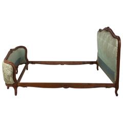Antique Late 19th Century French Carved Bedstead of Shaped Form