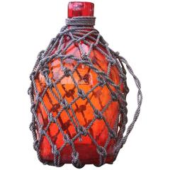 Vintage Glass Jug with Netting