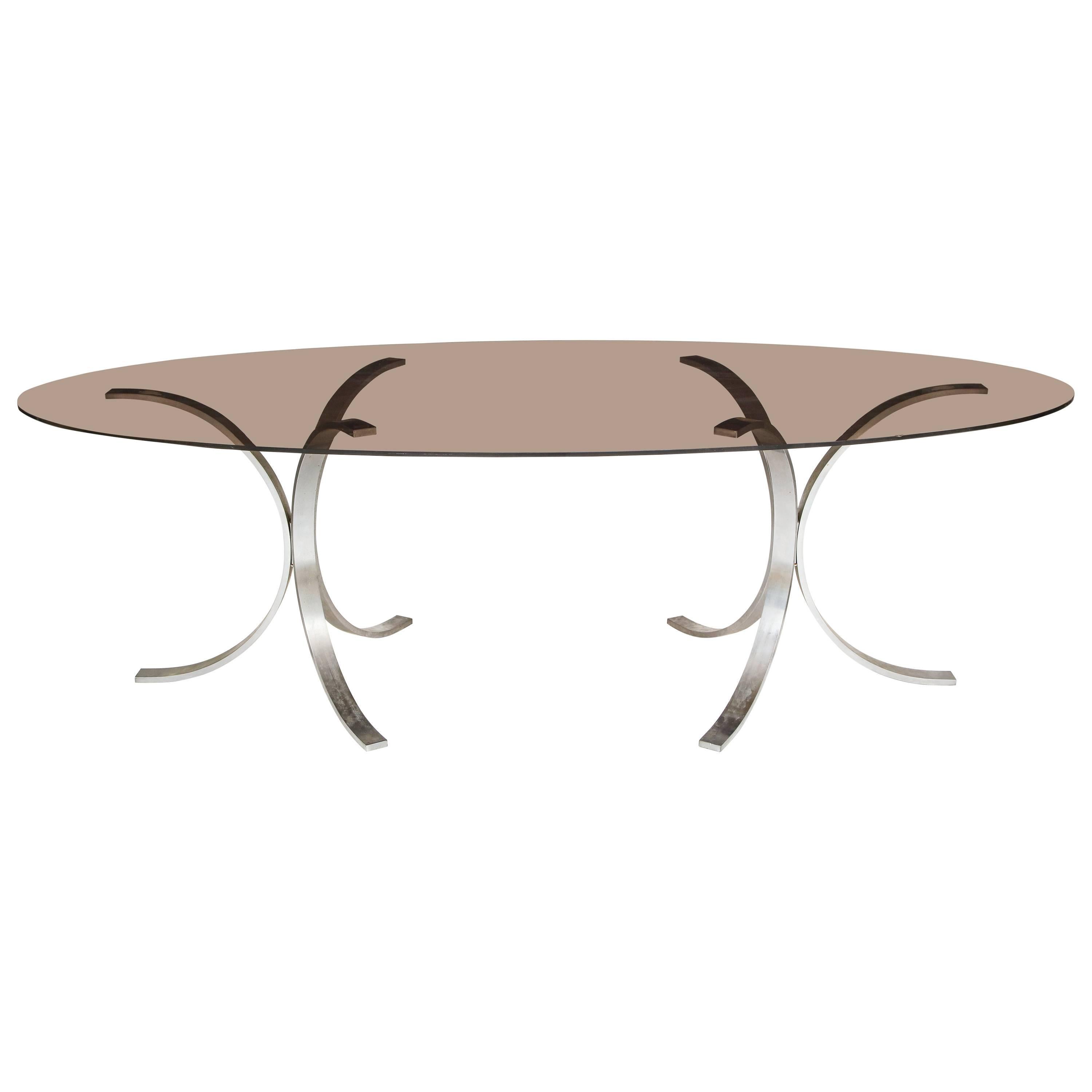 Mid-Century Italian Chrome Dining Table, 1970
Lovely 1970s dining table with chrome legs and oval glass top.

  