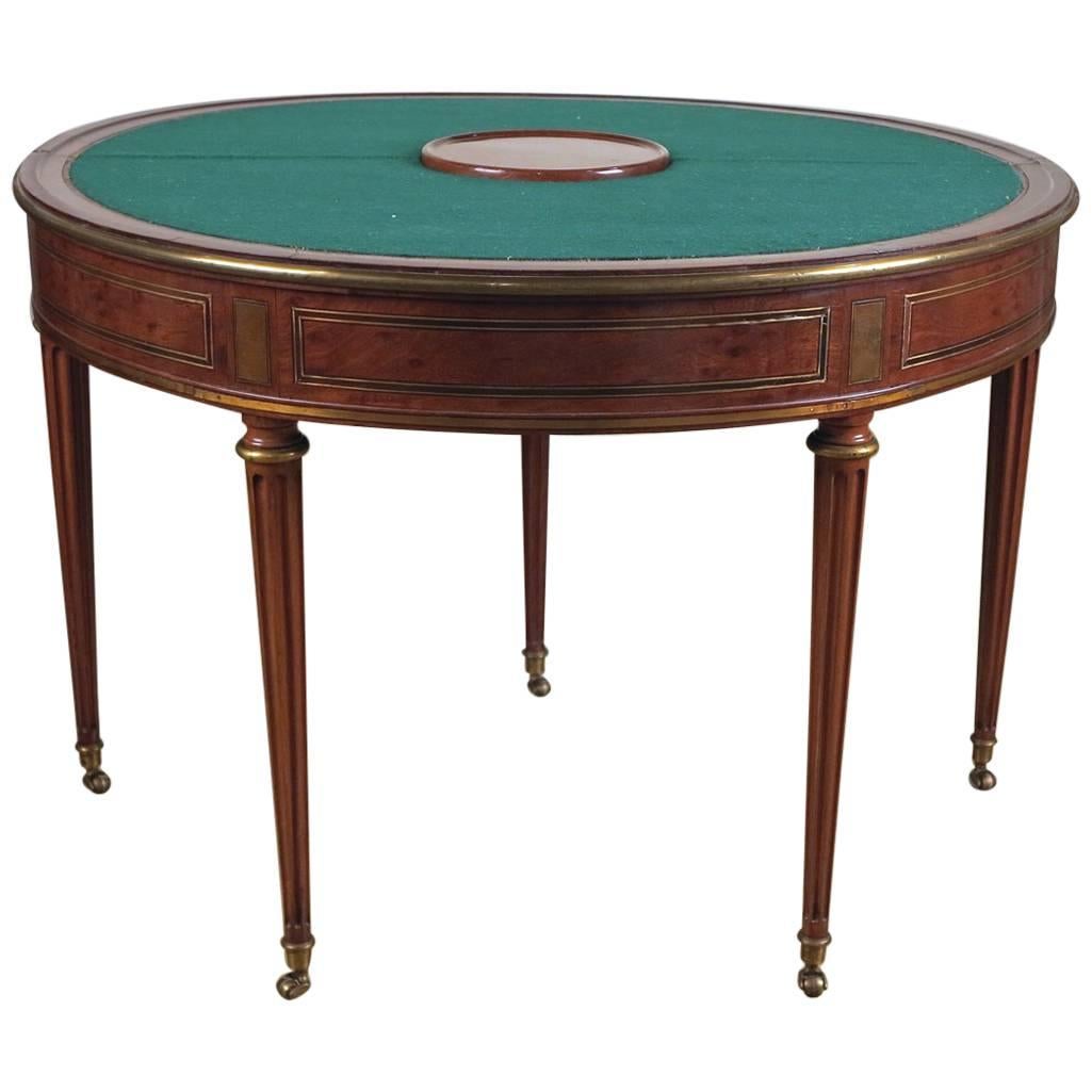 Table de jeu Louis XVI en ébène et acajou monté sur laiton par Godefroy Dester en vente