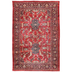Antique Persian Sultanabad Rug with Botanical Elements Set on Red Field