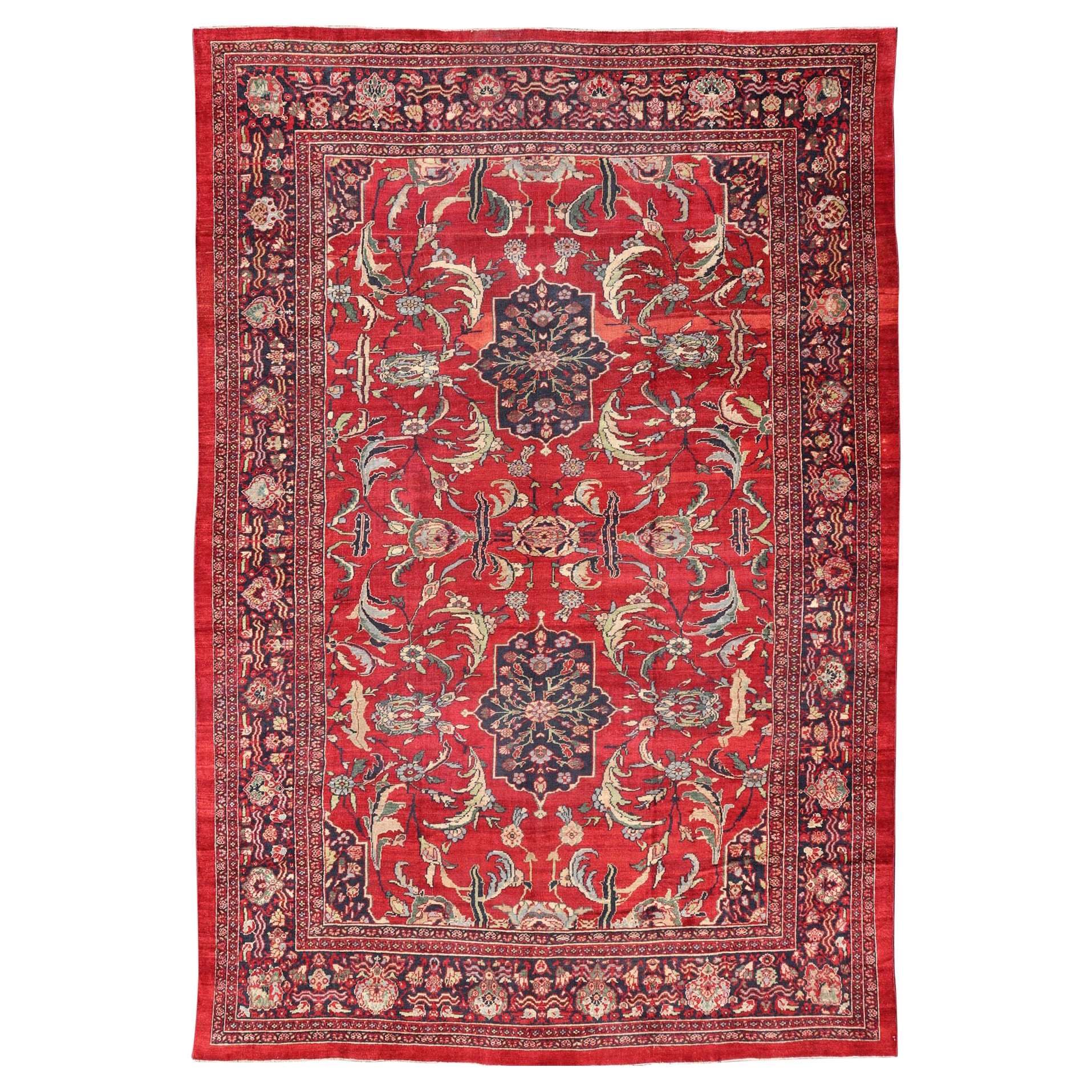 Antique Persian Zeigler Sultanabad Rug with Botanical Elements Set on Red Field For Sale