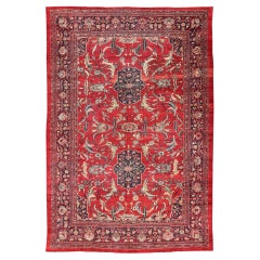 Tapis persan ancien Zeigler Sultanabad avec éléments botaniques sur fond rouge