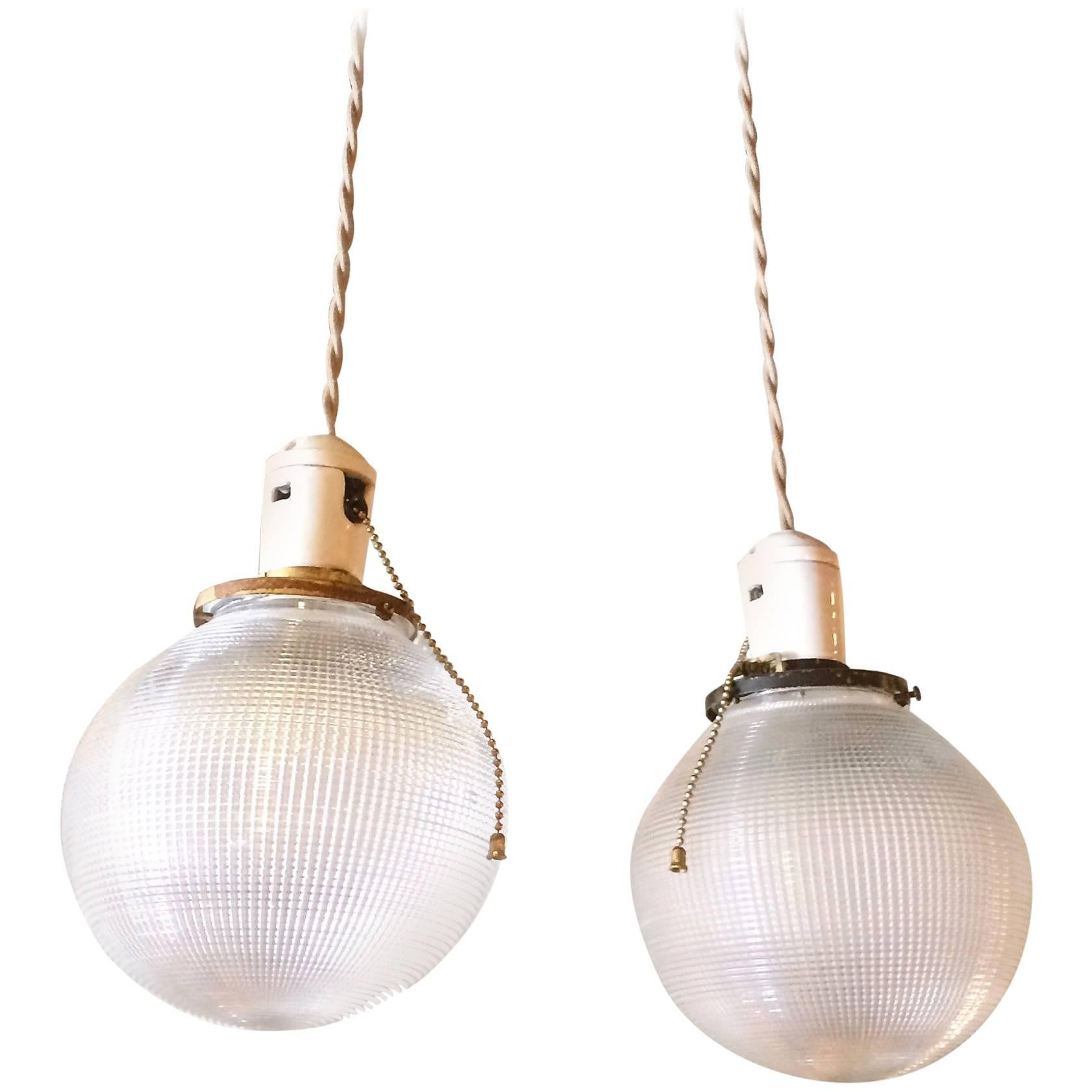 Pair of Industrial Holophane Glass Globe Pendant Lights