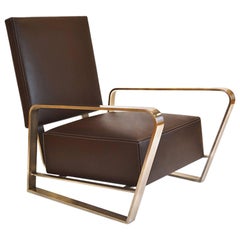 Corliss Lounge Armchair with Leather Seating and Polished Stainless Steel Body