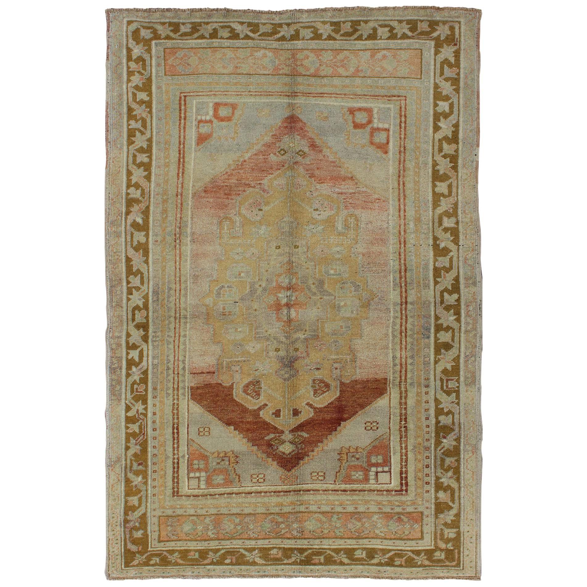 Vintage Turkish Oushak with Large Central Medallion in Cream, Yellow, Brown and  For Sale