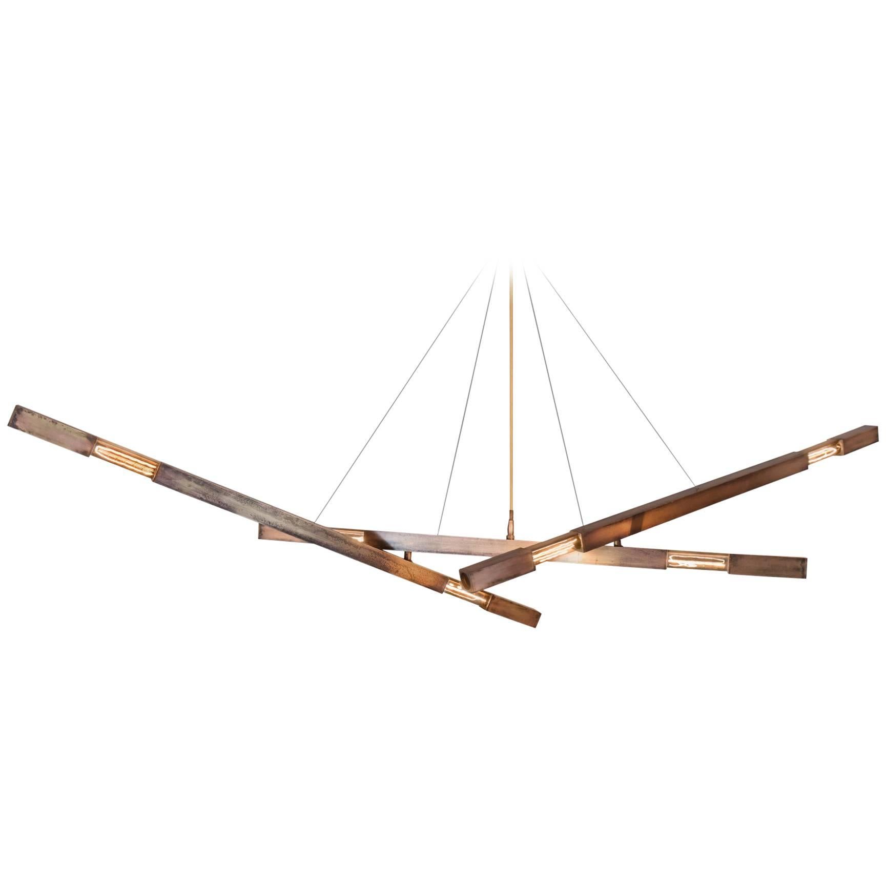 Large Three-branch Dynamic Stilk Chandelier in Brass.

The Daikon Stilk chandelier features three branches. Each branch is connected using swivel mounts. The swivel feature allows the Stilk chandelier to be positioned on-site, for true