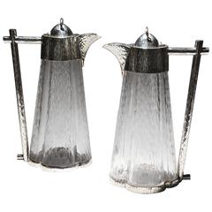 Pair of Silver Plate and Cut-Glass Aesthetic Movement Claret Jugs