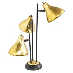 1950s Gerald Thurston Adjustable Brass and Black Table Lamp for Lightolier