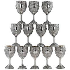 Antique Style Solid Silver Set of 12 Embossed Goblets, circa 2010