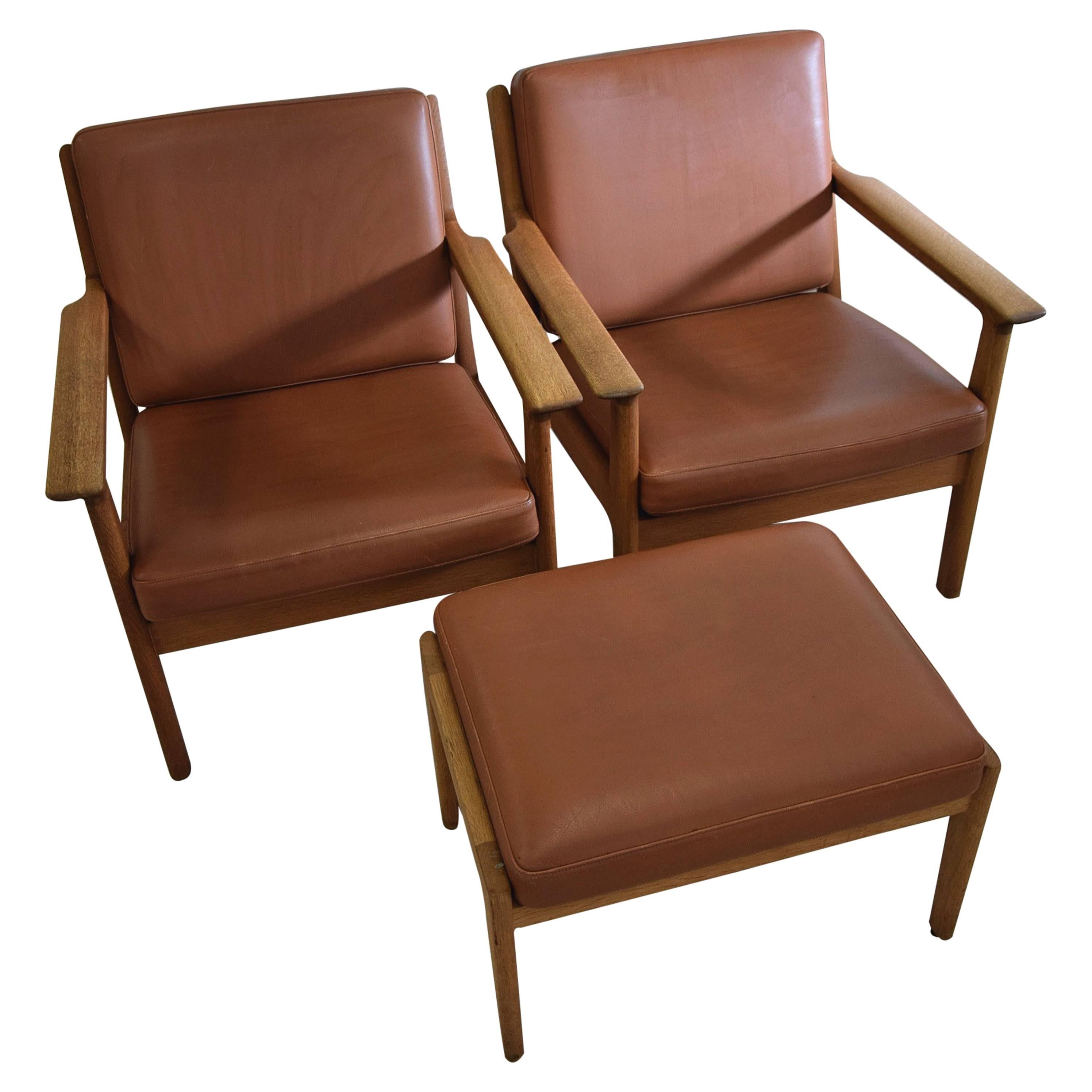 Mid-Century Modern Hans Wegner Lounge Chairs and Hocker