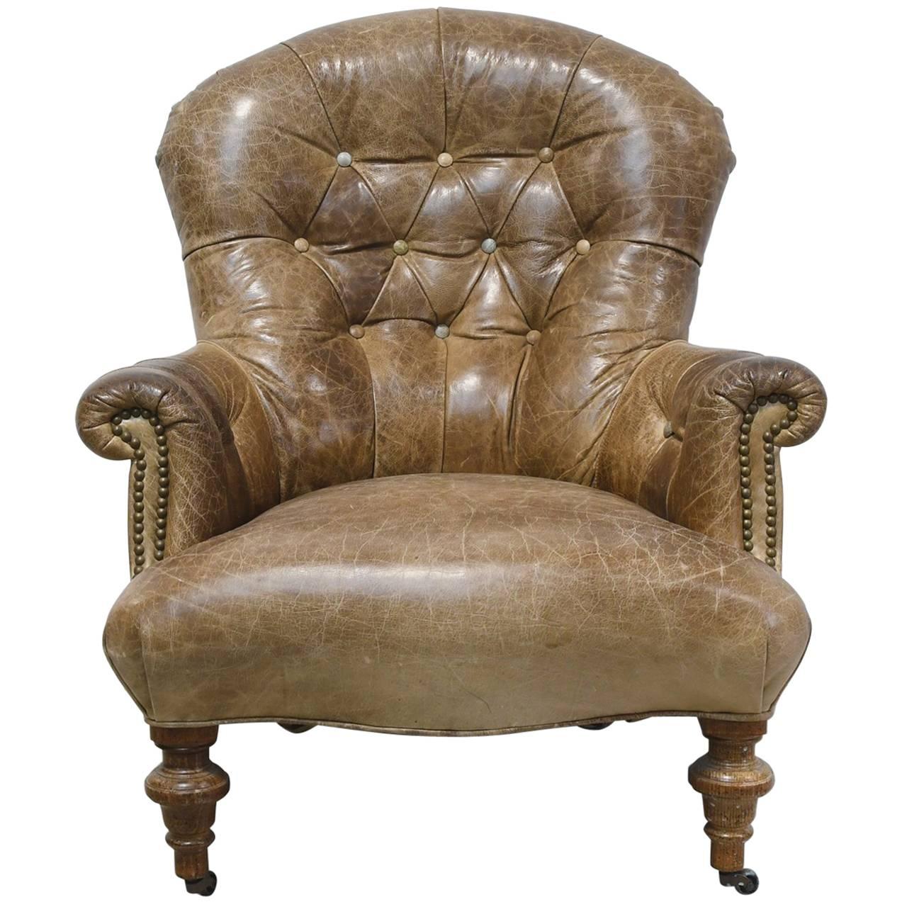 Worn Brown Leather Club Chair with Scrolled Arms, Tufted Back and Turned Feet