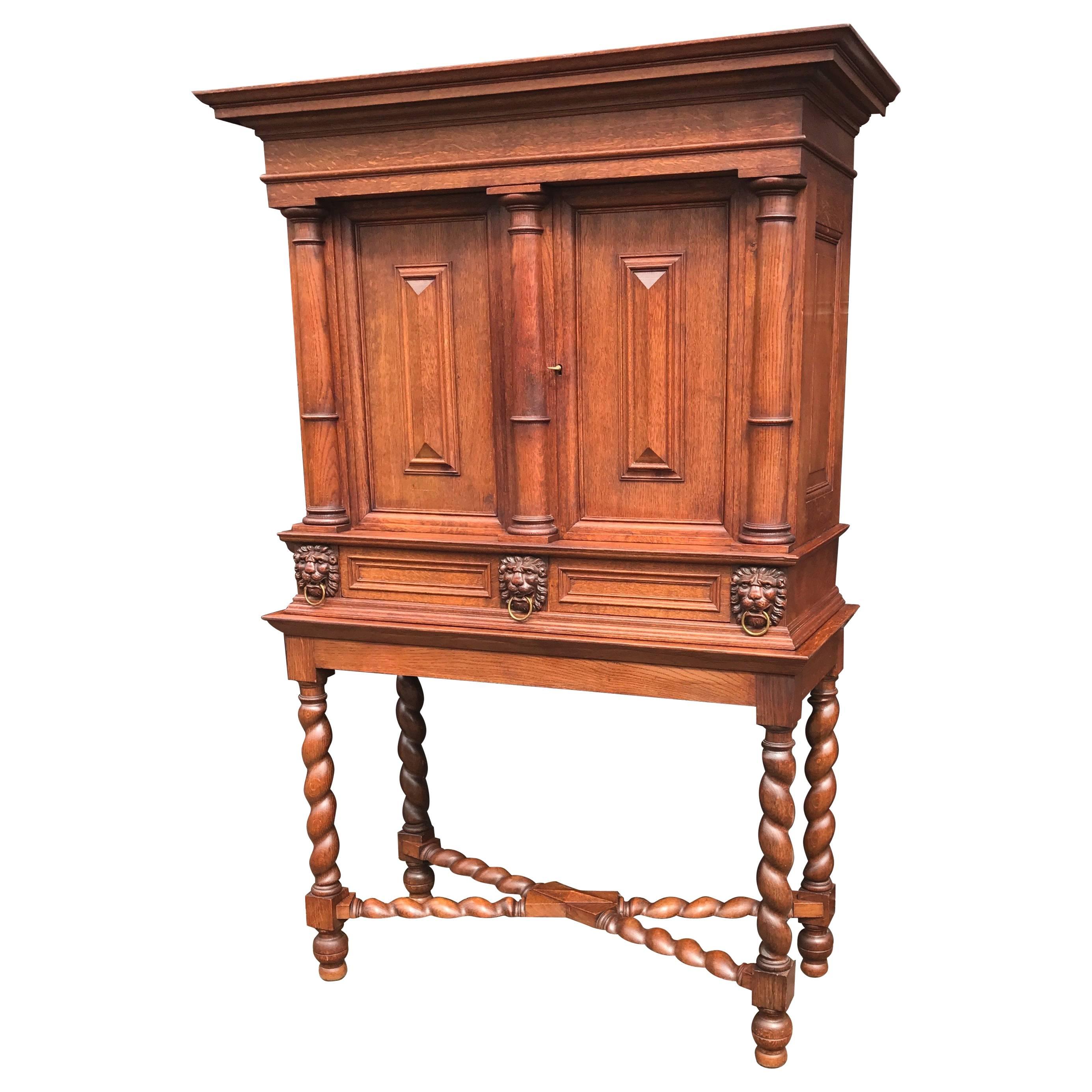 Stunning Baroque Revival Tiger Oak Cabinet with Lion Heads and Barley Twist Base