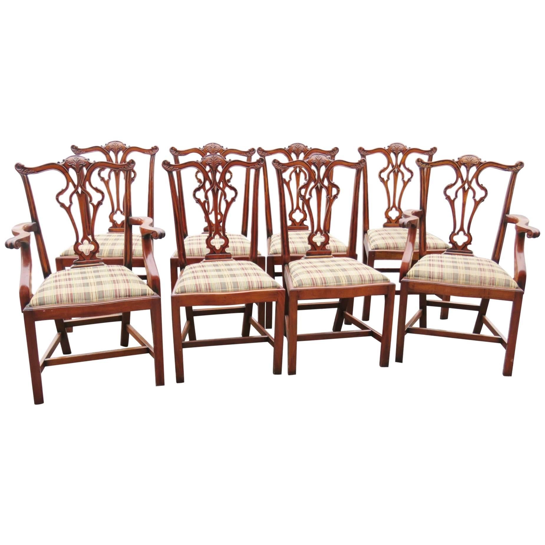 Eight Carved Upholstered Dining Chairs