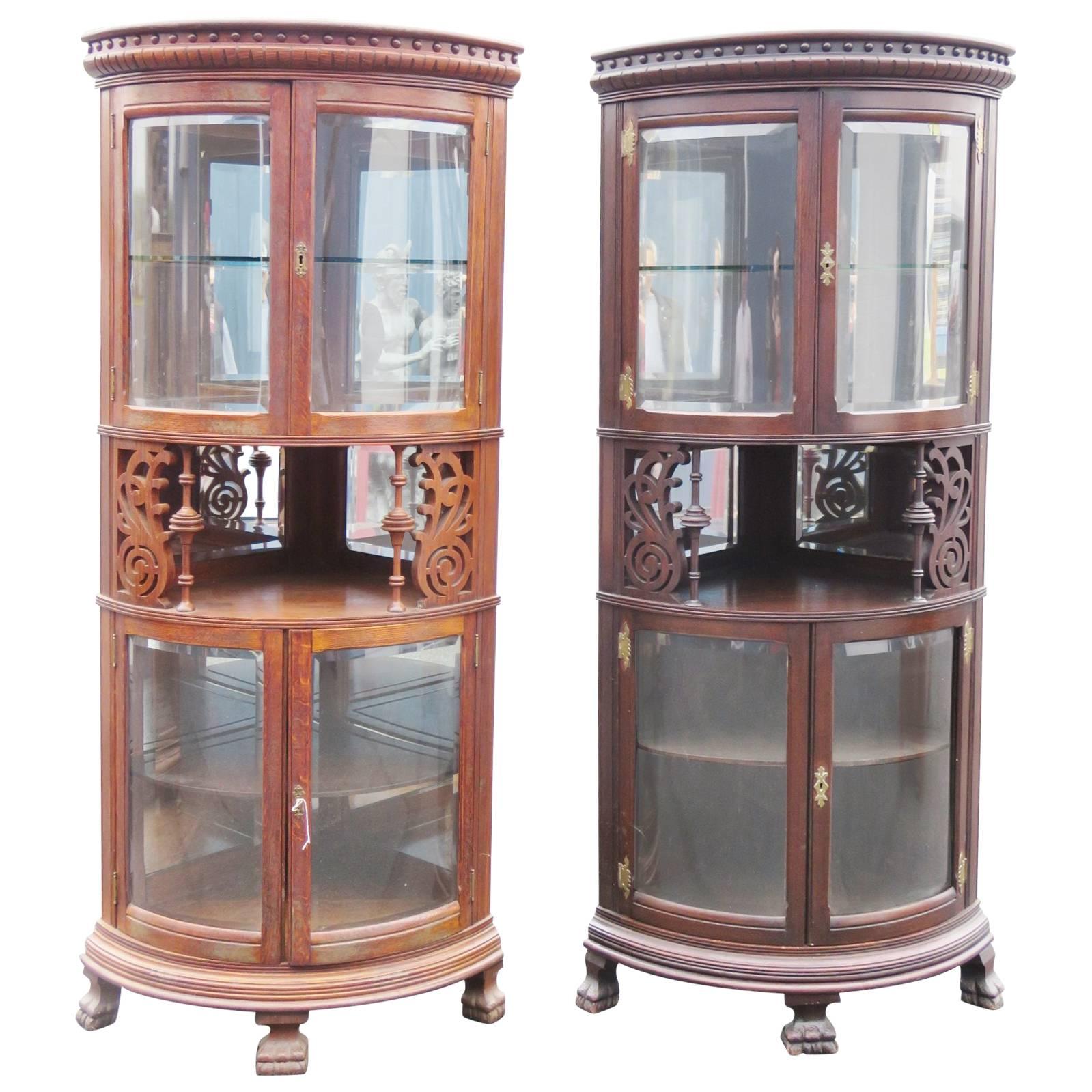 Rare Companion Pair of Oak Carved Corner Cabinets