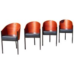 Philippe Starck Set of Four Rosewood Leather and Steel Three Legged Chairs