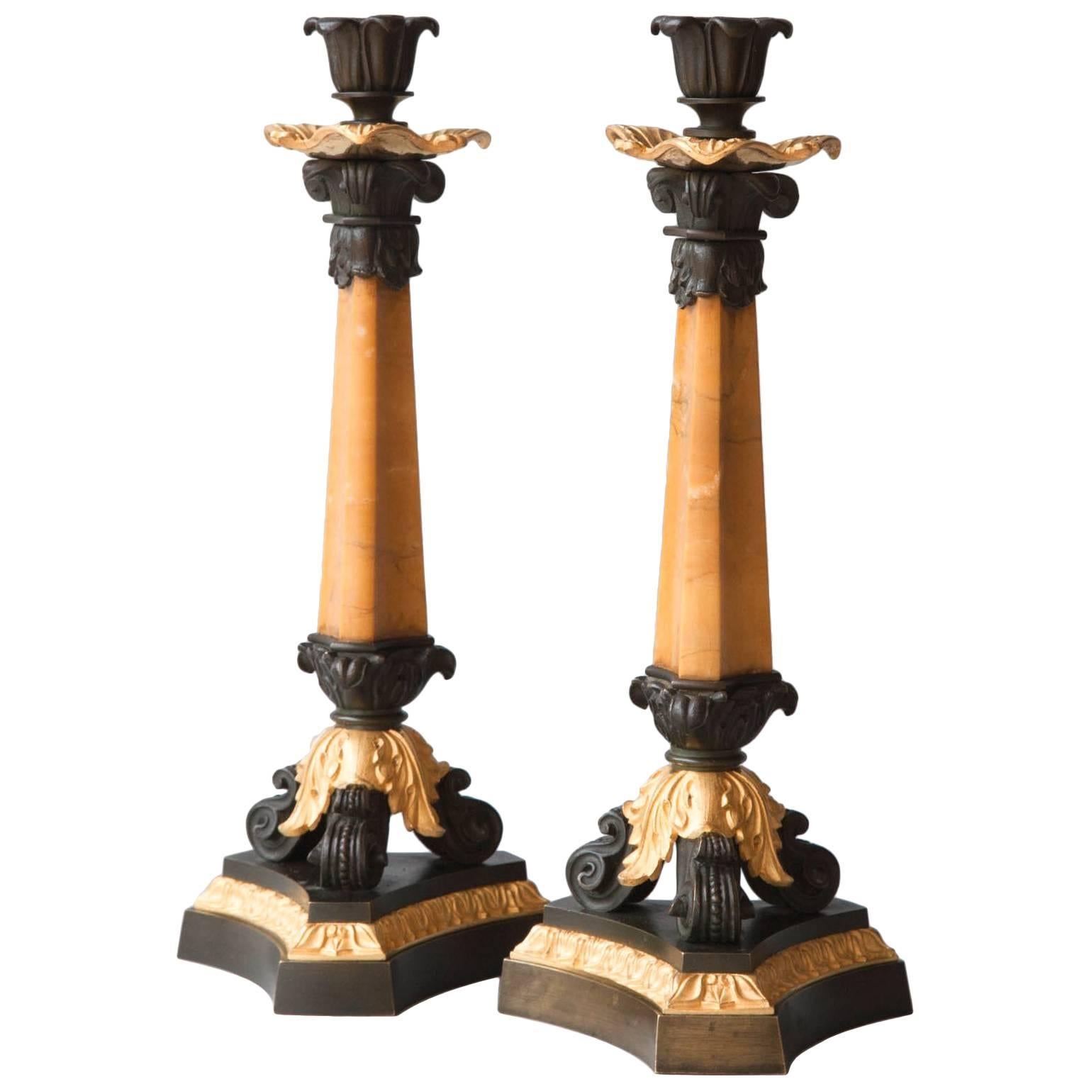 Pair of French Restauration Sienna Marble, Patinated and Gilt Bronze Candlestick For Sale