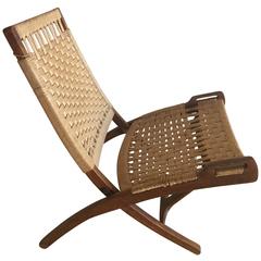 Chaise pliante du milieu du siècle:: style Hans Wegner