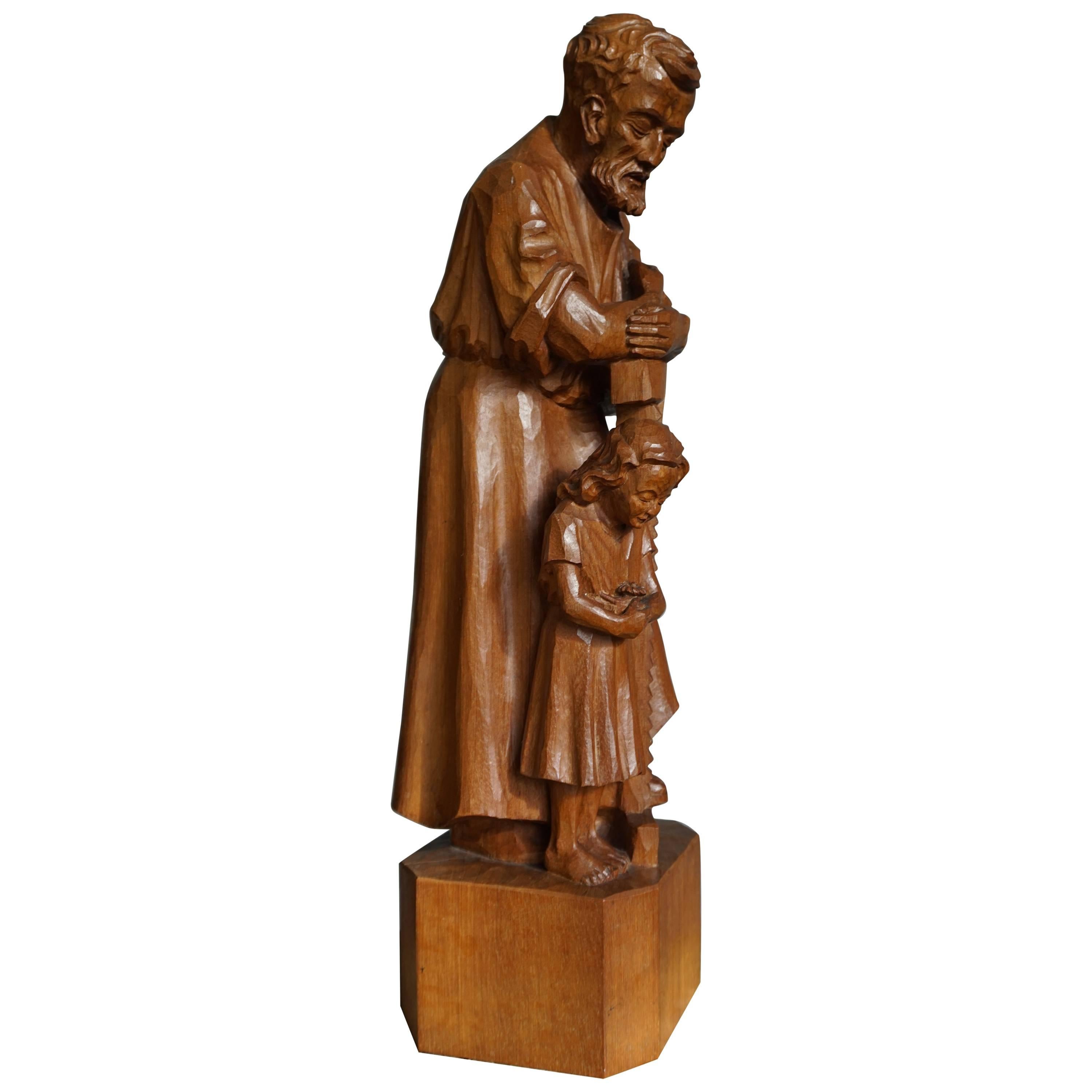 Impressive Hand-Carved Mourning Father and Daughter Sculpture of Afromosia Wood