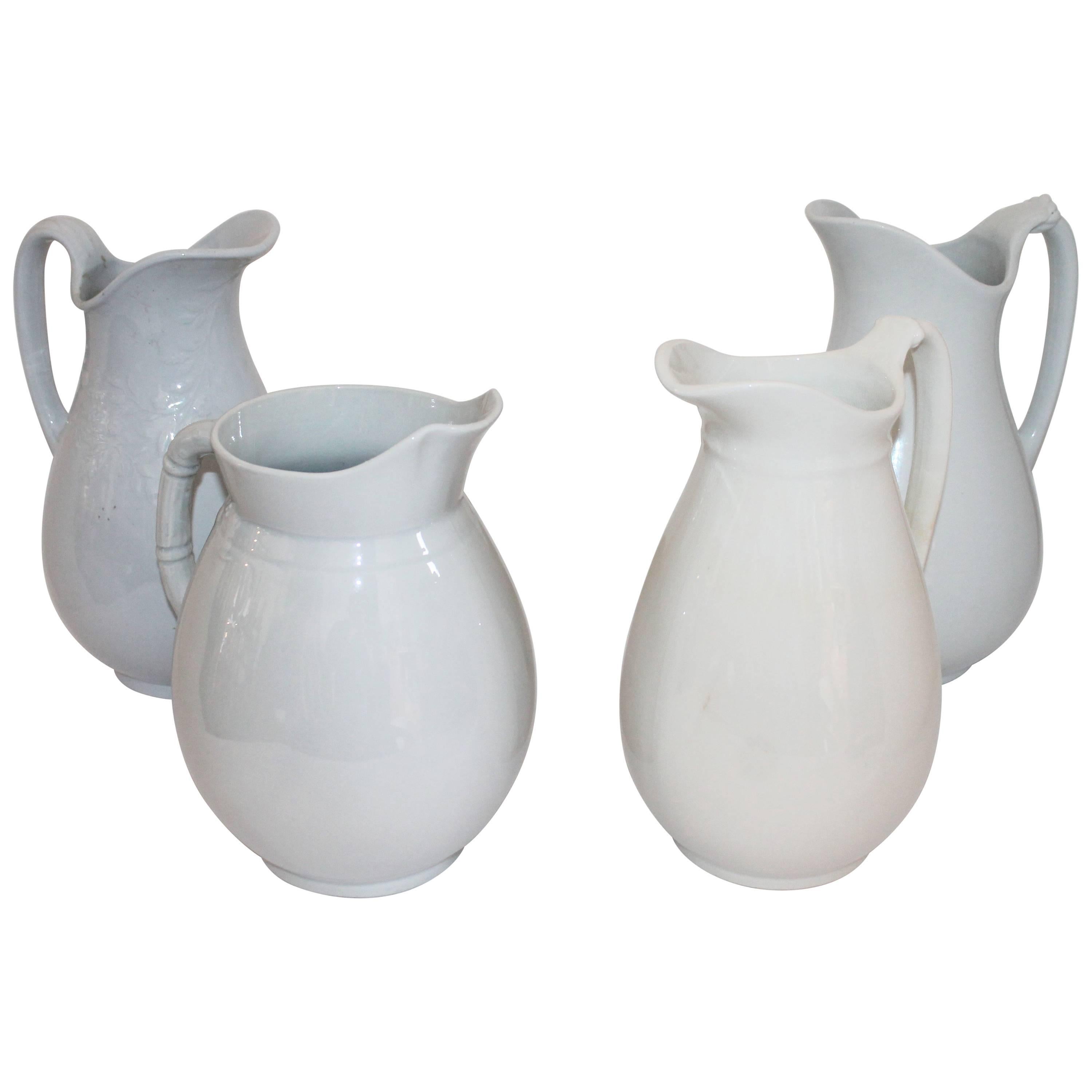 Collection of Four 19th Century Iron Stone Pitchers
