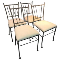 Used Exceptional Suite of Four Sculptural Iron Chairs in the Manner of Giacometti
