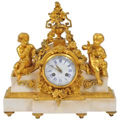 Pendule de cheminée ancienne de style Louis XVI:: Raingo Frères:: Paris