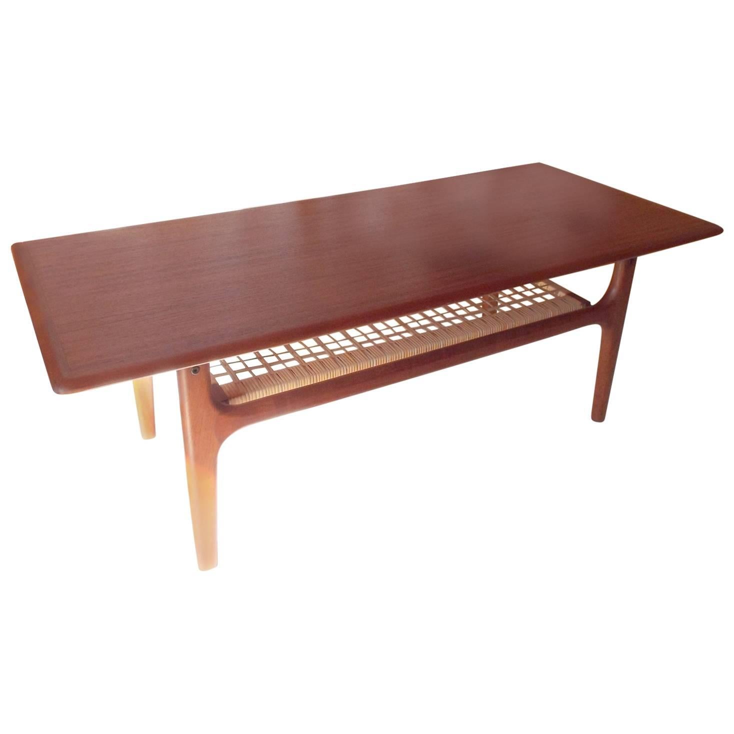 Danish Coffee Table by Trioh Møbler with Teak frame and Cane undershelf For Sale