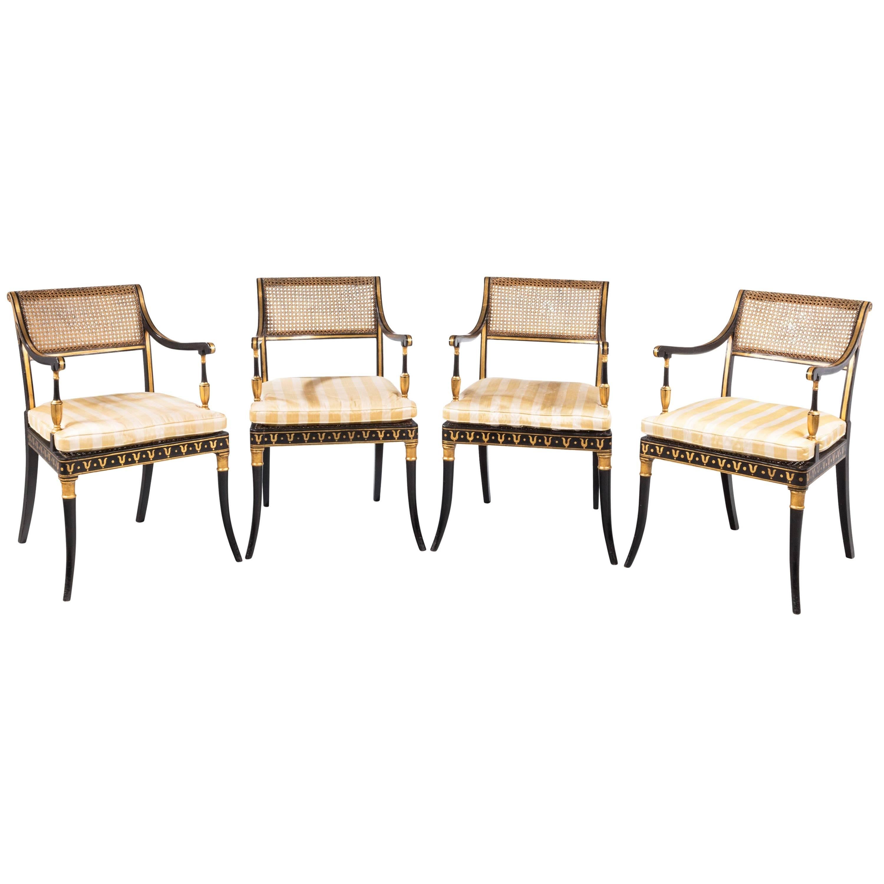 Set of Four Regency Period Lacquered and Parcel Gilt Elbow Chairs