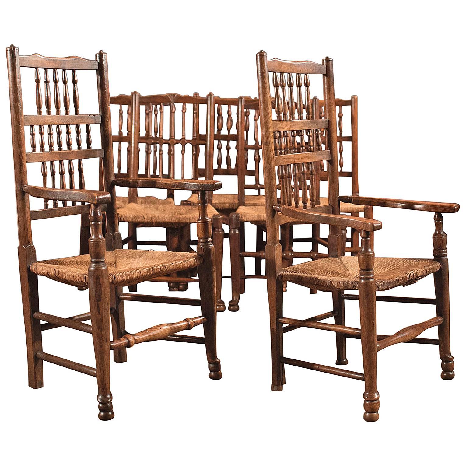 Harlequin Set of Seven Antique Spindle Back Dining Chairs, circa 1800