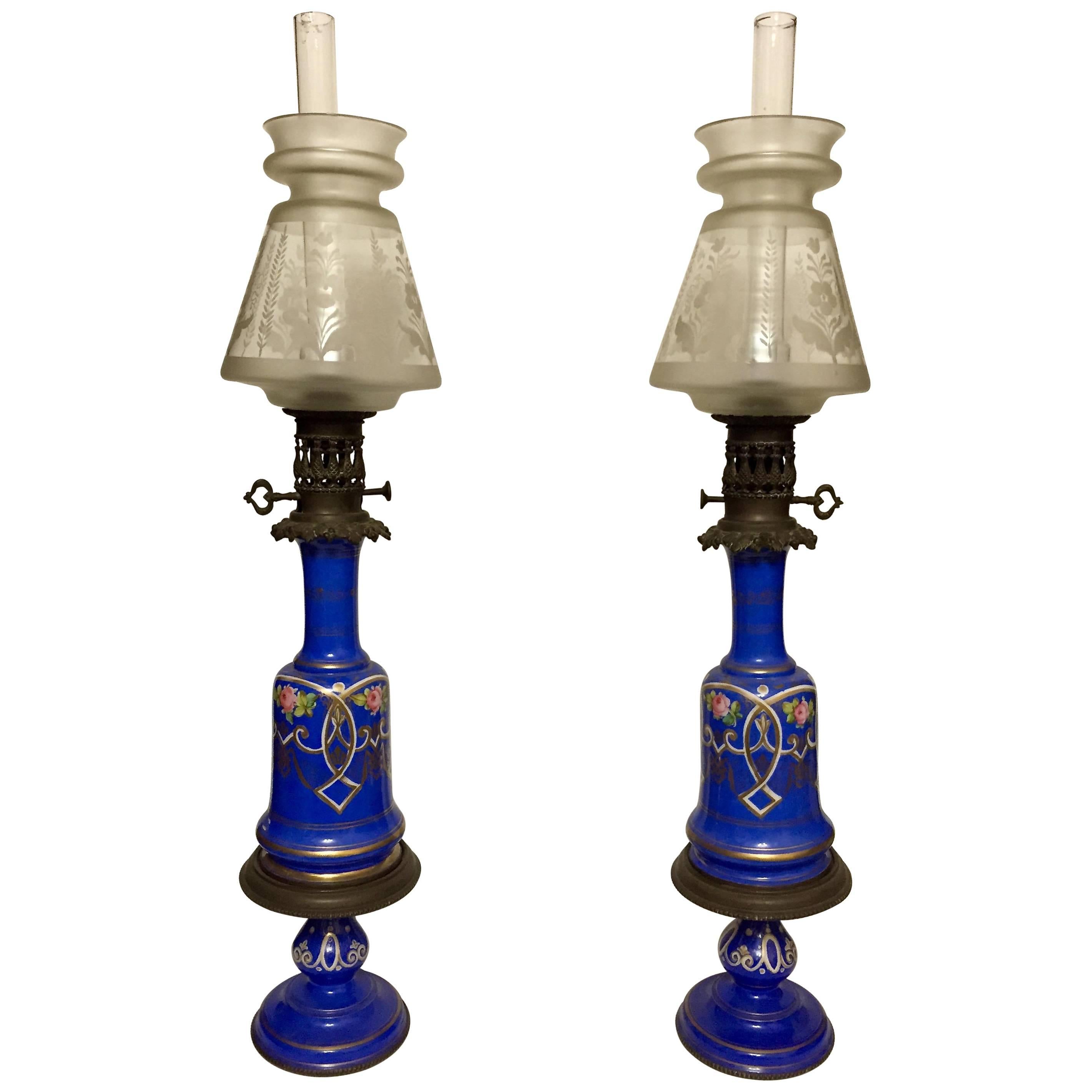 Pair of Blue Gilt and Enamelled Bohemian Glass Oil Lamps with Matching Stands For Sale
