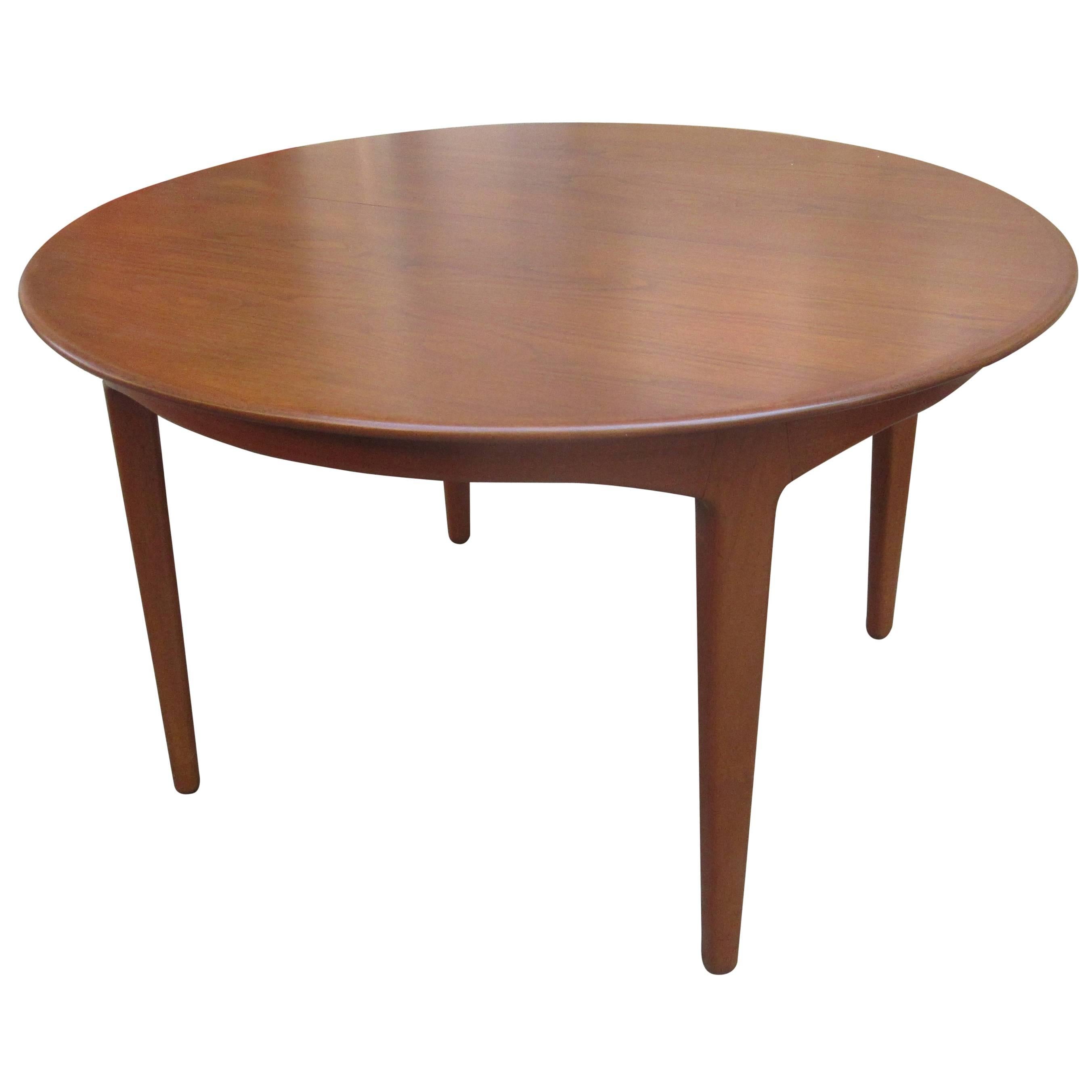 Henning Kjaernulf Teak Round Table with Four Leaves
