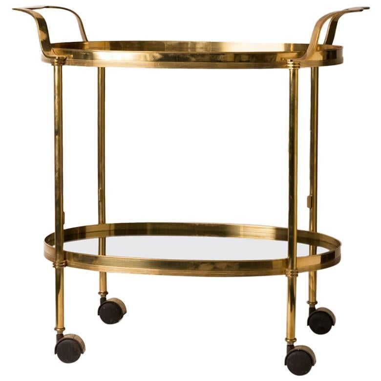 French Mid-Century Oval Brass and Smoked Glass Bar Cart