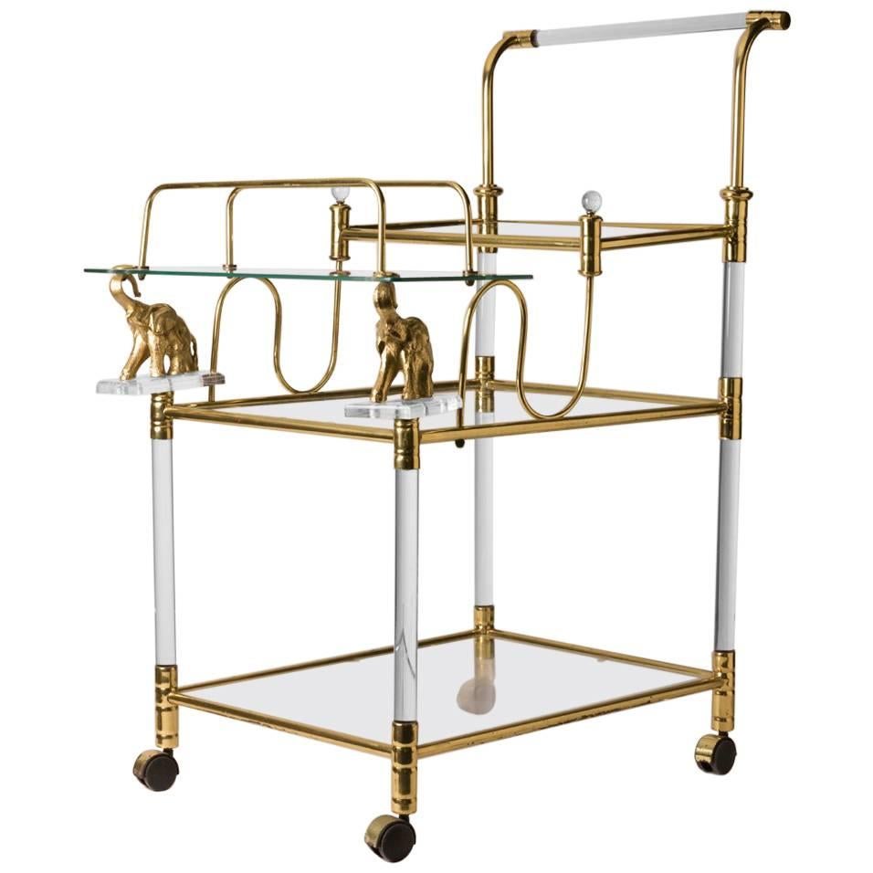 French Mid-Century Lucite and Brass Bar Cart Featuring Elephant Detail