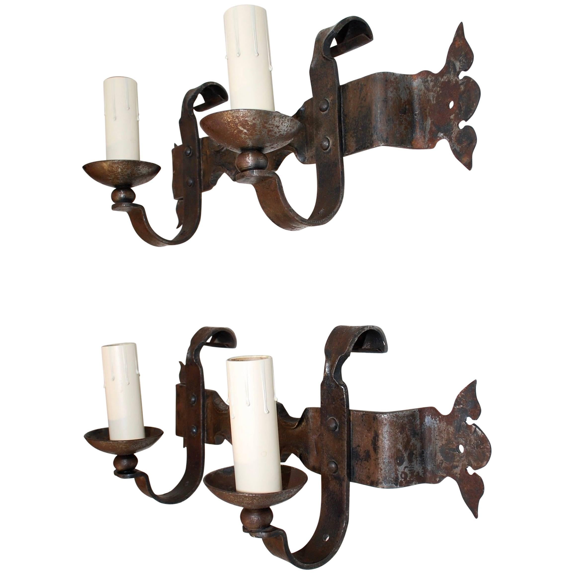 Pair of French 1940s Handmade Wrought Iron Sconces For Sale