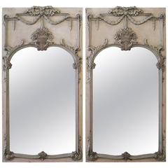 20th Century Pair of Polychrome Carved Trumeaus with Antique Style Mirrors