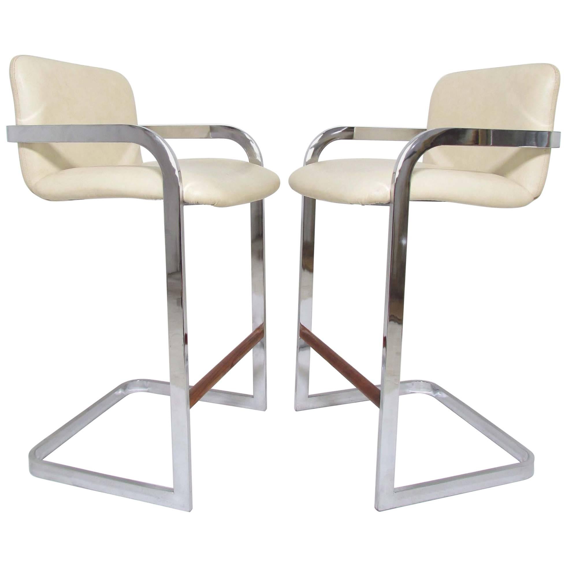 Pair of Chrome Cantilever Bar Stools by Design Institute America (DIA)