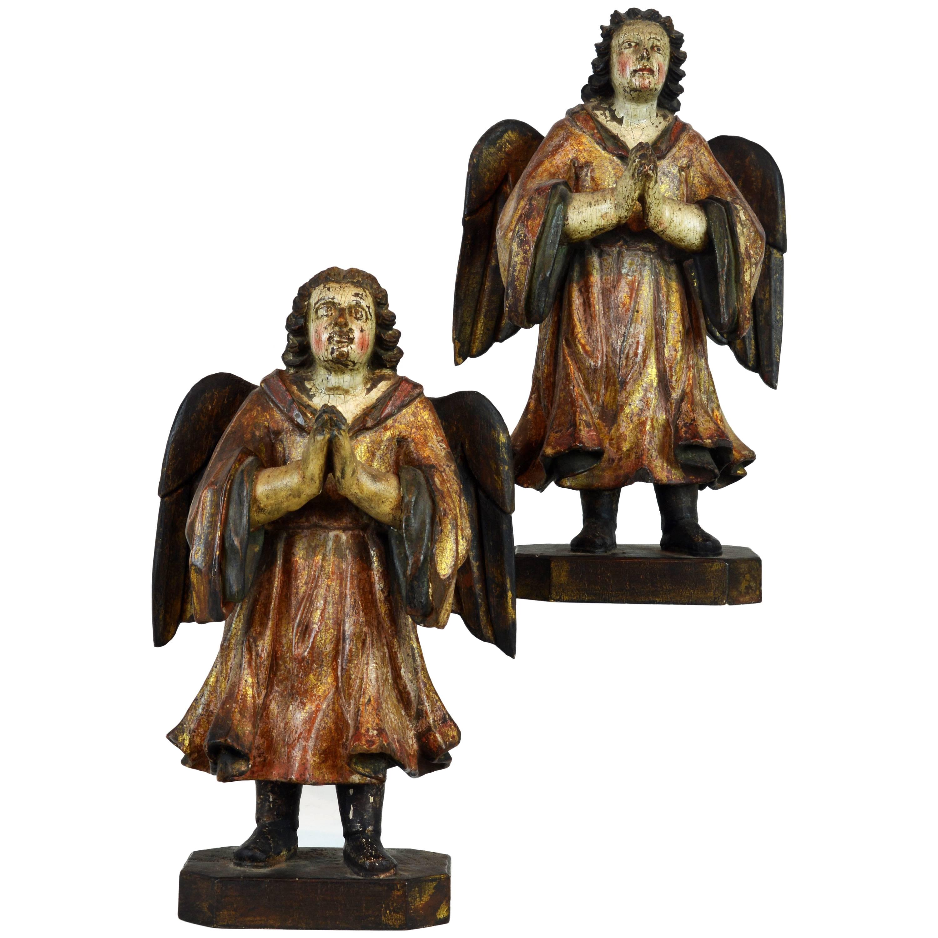 Fine Pair of Early Spanish Colonial Carved Paint and Parcel Gilt Angels