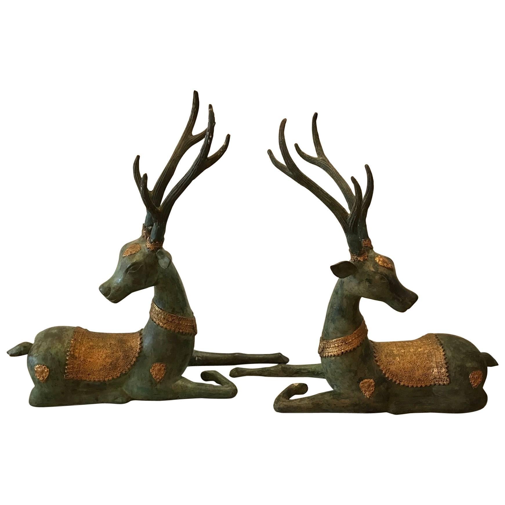 Pair of Patinated and Parcel Gilt Bronze Deer Stags
