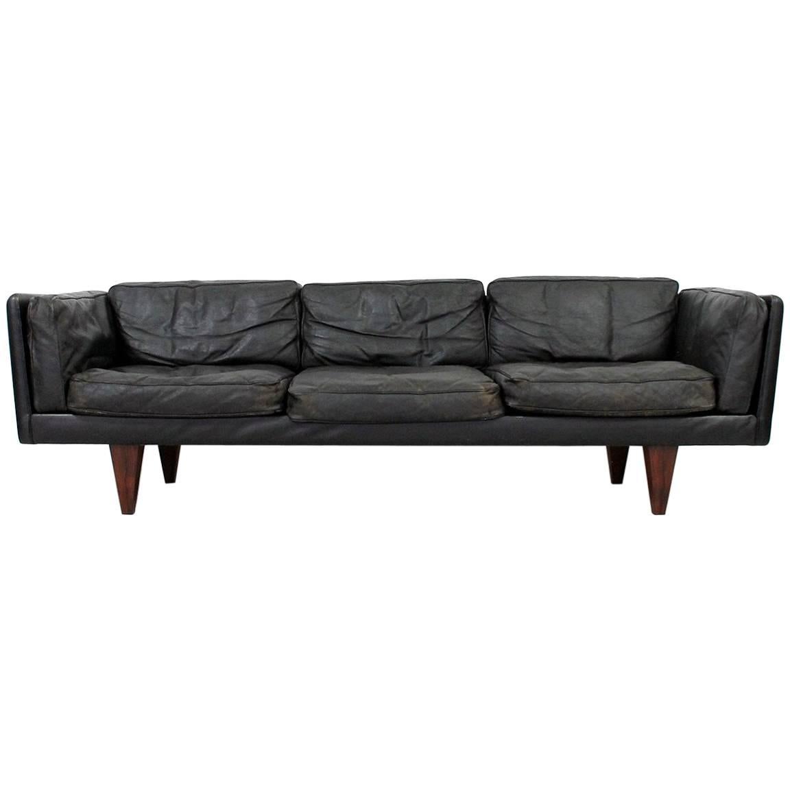 Leather and Rosewood Sofa by Illum Wikkelso