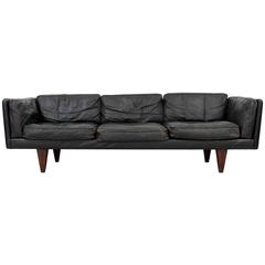 Leather and Rosewood Sofa by Illum Wikkelso