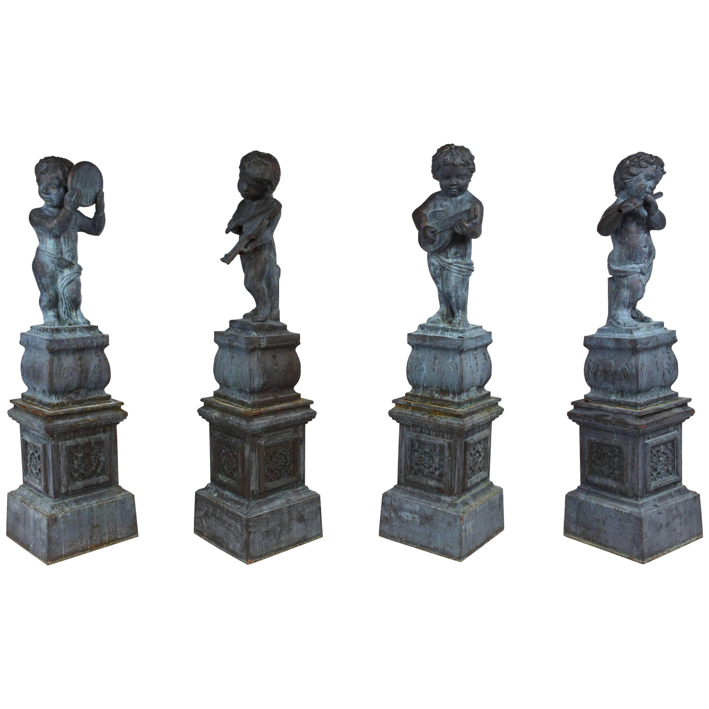 Set of Four Neoclassical-Style Cast Iron Garden Statues